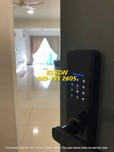 Room features: white walls, glossy tile flooring, ceiling fan, door with electronic lock, curtains, visible living area, natural light from windows.