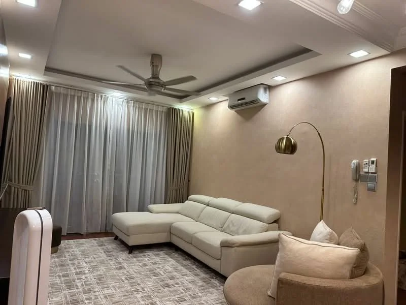 Living features: L-shape sectional sofa in cream, area rug with geometric pattern, 5-blade ceiling fan with light, recessed downlights, floor-to-ceiling sheer curtains, cream painted walls, wall-mounted air conditioning unit, decorative floor lamp, telephone on wall, wall-mounted light switches, light-colored flooring; style: modern.