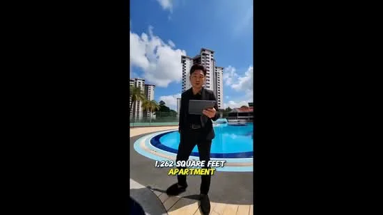 Exterior type: high-rise condominium; features: swimming pool, pool deck with loungers, surrounded by palm trees, multiple high-rise buildings in background, clear blue sky, manicured landscaping; style: modern.