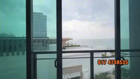 Room features: floor-to-ceiling windows, glass balcony railing, city skyline view, sea view, grey walls, concrete flooring; style: modern; view: sea.