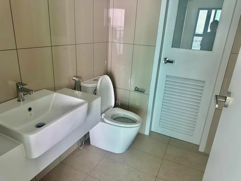 Bathroom features: white ceramic toilet, single-sink vanity with rectangular basin, chrome basin mixer faucet, large wall mirror, light beige tiled walls, light beige tiled flooring, glass door, ventilation louver, window for natural light; style: modern.