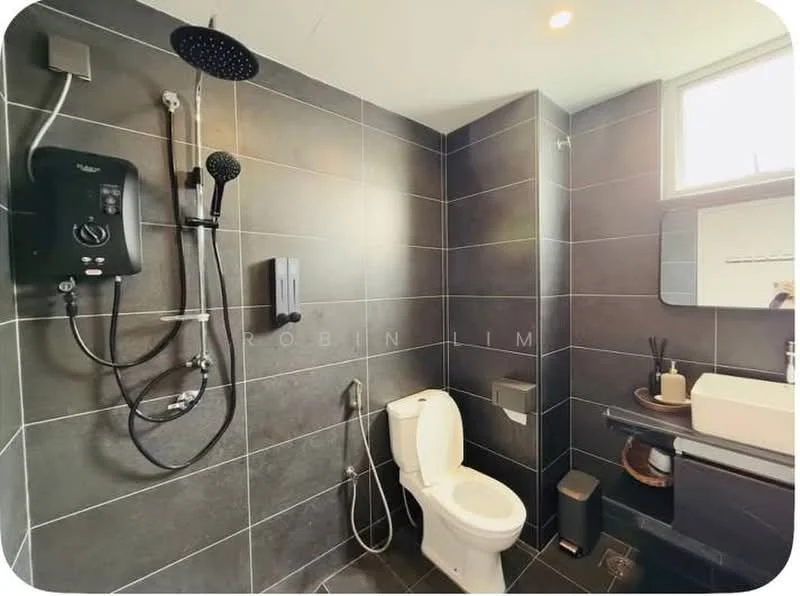 Bathroom features: grey tile cladding on walls, grey tile flooring, walk-in shower with rain shower head, handheld shower, chrome basin mixer faucet, white rectangular sink, single-sink vanity with dark cabinetry, one-piece toilet, toilet paper holder, mirror above sink, shower wall-mounted control panel, shower hose, small waste bin; style: modern.