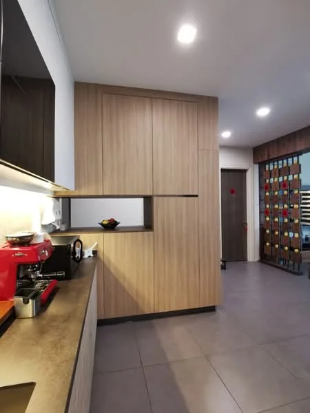 Kitchen features: laminate cabinetry in wood finish, black countertop, built-in coffee machine, stainless-steel sink, recessed LED downlights, grey tile flooring, open shelving, wine rack, wall-mounted door, fruit bowl on countertop; style: modern.
