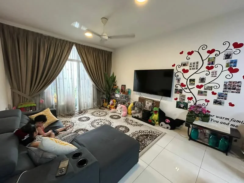 Living features: L-shape sectional sofa in grey, coffee table, wall-mounted TV, decorative wall with photos and hearts, floor-to-ceiling windows with sheer curtains, white painted walls, area rug with intricate pattern, ceiling fan, potted plants, decorative vases, toys and stuffed animals, decorative flowers; style: modern.