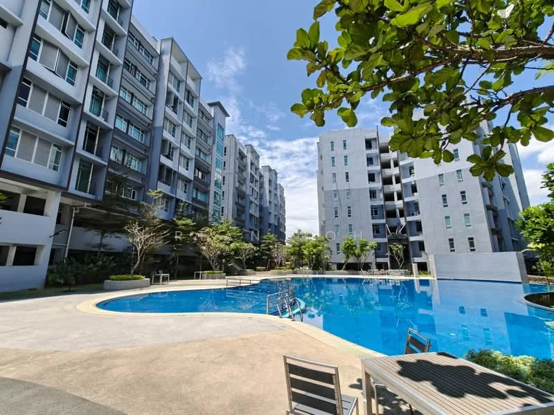Exterior type: mid-rise condominium; features: swimming pool, pool deck with loungers, landscaped garden, manicured lawn, multiple residential blocks, balconies on units, trees and greenery surrounding the area, concrete pathways; style: modern.