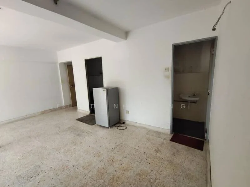 Room features: white painted walls, tile flooring, single-door bathroom, single-door room, fridge, sink, light fixture, floor mat.