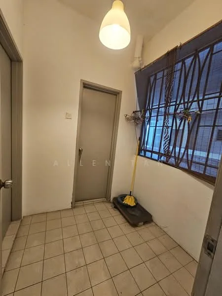 Room features: white painted walls, tile flooring, single pendant light, metal security grille on window, door with handle, mop on a mat, corner space, window with natural light.