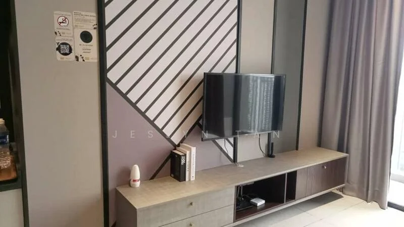 Living features: wall-mounted TV, TV console with storage, decorative wall with geometric pattern, grey painted walls, curtains, decorative books, white decorative object, light-colored flooring; style: modern.