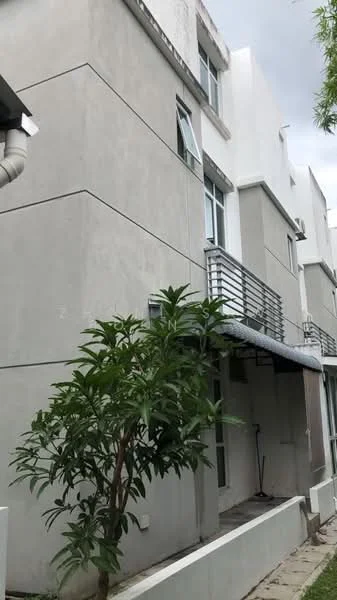 Exterior type: linked terrace house; features: grey concrete facade, flat roof, recessed balconies, metal railings on balconies, large windows, manicured landscaping, paved walkway, single-storey, surrounded by greenery; style: modern.
