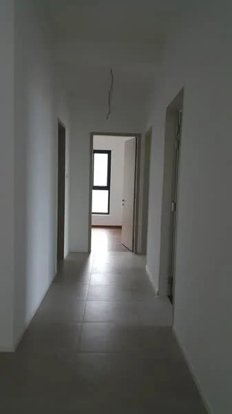 Hallway features: white painted walls, grey tile flooring, recessed ceiling, doorways leading to other rooms, natural light from windows, minimalist design, neutral color palette, straight corridor layout; style: modern.