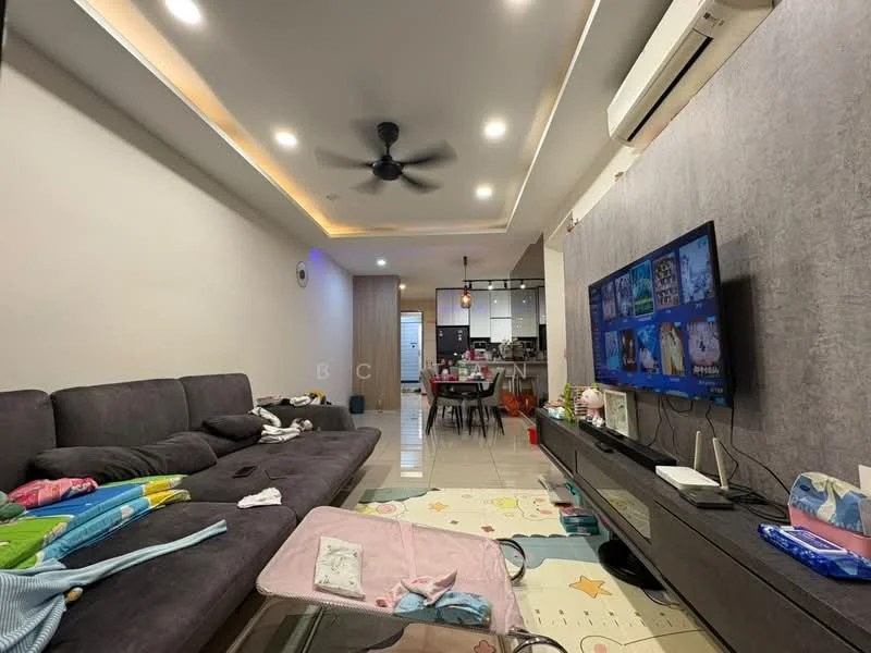 Living features: 3-seater fabric sofa in grey, ceiling fan, recessed LED downlights, wall-mounted TV, TV console, decorative wall panel, tile flooring, area rug with playful design, open-plan layout leading to kitchen, light-colored walls, sliding glass door, visible kitchen area in background; style: modern.