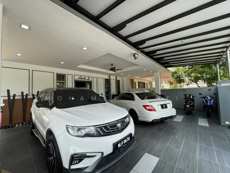 Exterior type: car porch; features: two parked cars, one motorcycle, grey tiled flooring, ceiling with exposed beams, recessed lighting, wall-mounted ceiling fan, decorative wall with artwork, landscaped greenery, open-air design, modern architectural style; style: modern.