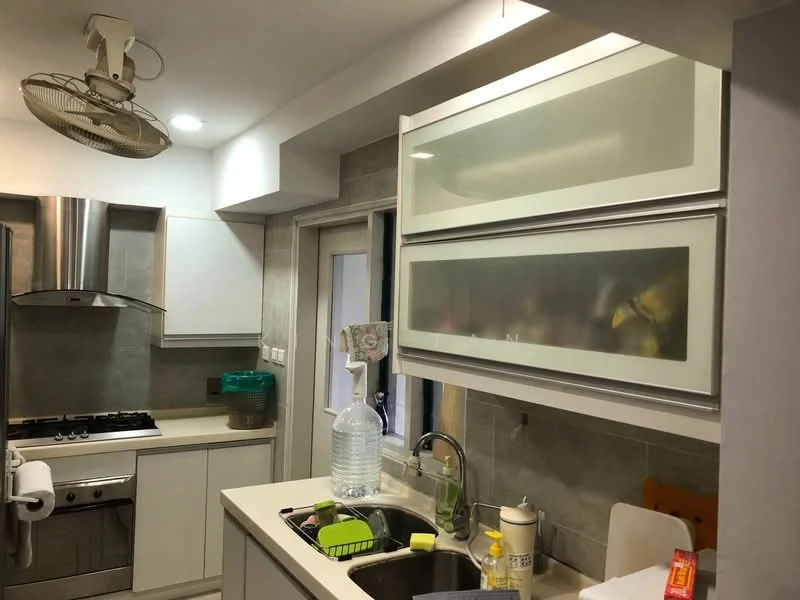 Kitchen features: white cabinetry with glass-front upper cabinets, stainless-steel range hood, 4-burner gas hob, built-in oven, single-bowl stainless-steel sink, chrome pull-down faucet, light grey tiled backsplash, light grey wall tiles, cream countertop, ceiling fan, window with sheer curtains, kitchen utensils and appliances visible on countertop; style: modern.