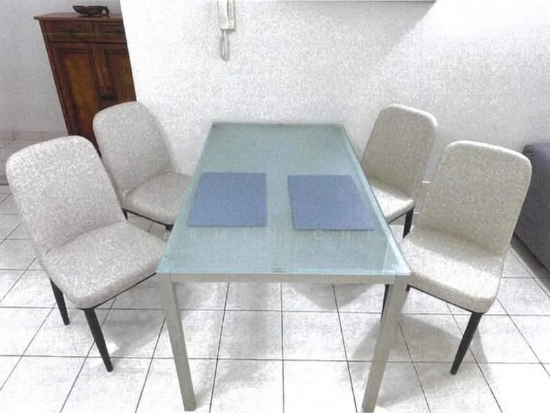 Dining features: glass dining table, 4 upholstered dining chairs, light grey fabric upholstery on chairs, metal legs on table and chairs, tile flooring, white painted walls, wooden cabinet in background, neutral color scheme; style: modern.