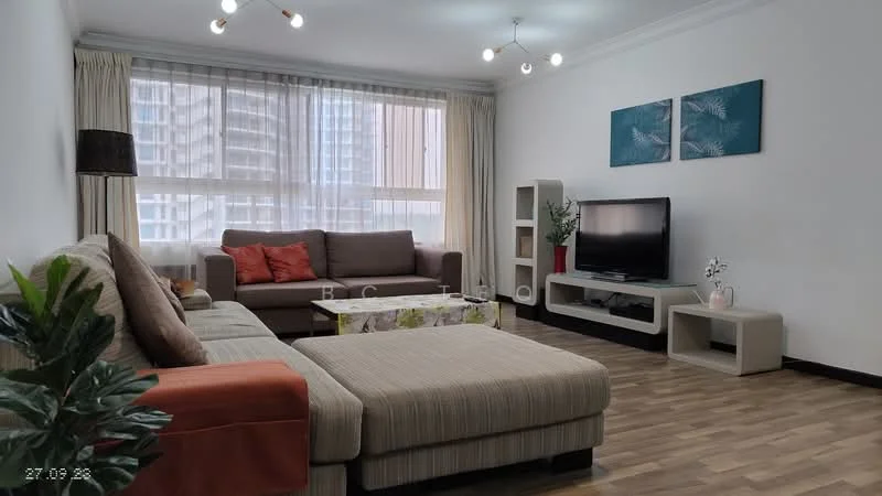 Living features: L-shape sectional sofa in beige and orange, coffee table with floral design, TV console, wall-mounted TV, built-in shelving unit, wooden flooring, large windows with sheer curtains, recessed ceiling lights, decorative wall art with botanical theme, houseplant in ceramic pot; style: modern; view: city.