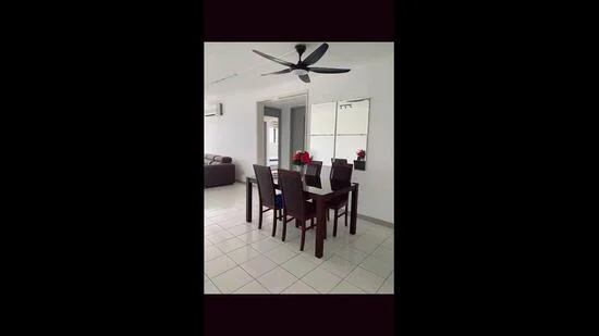Dining features: 6-seater dining table, wooden dining chairs, ceiling fan with light, white painted walls, tile flooring, mirror on wall, decorative flowers on table, air conditioning unit on wall; style: modern. Living features: fabric sofa in dark color, coffee table, wall-mounted TV, open layout to dining area; style: modern.