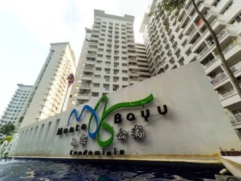 Exterior type: high-rise condominium; features: modern facade with signage, water feature in front, multiple storeys, balconies visible, landscaped area, swimming pool in foreground; style: modern.