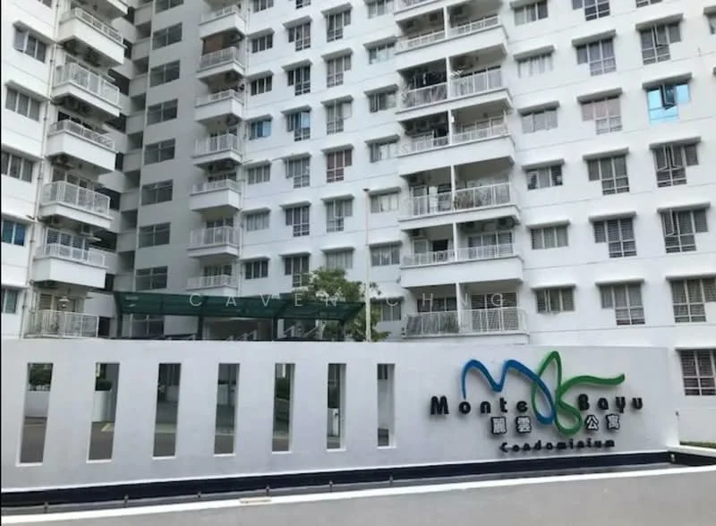 Exterior type: high-rise condominium; features: white painted facade, glass balcony railings, multiple floors visible, entrance with signage, landscaped area at entrance, surrounded by greenery; style: modern.