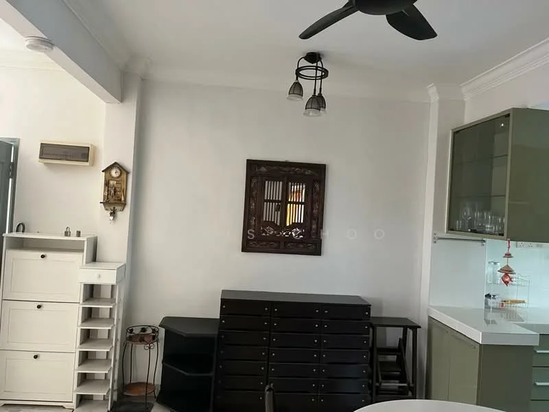 Room features: white painted walls, ceiling with crown moulding, 5-blade ceiling fan, hanging pendant light, wooden dining table, black wooden sideboard, green cabinetry, glass-front upper cabinets, decorative wall mirror, wall clock, wooden storage unit, tile flooring; style: modern.