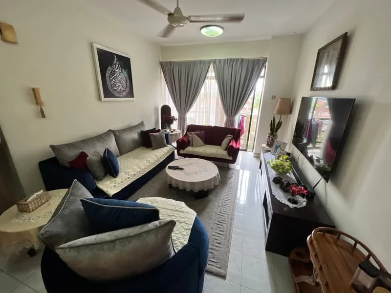 Living features: 3-seater fabric sofa in blue, 2-seater fabric sofa in burgundy, coffee table with round top, TV console with wall-mounted TV, area rug with neutral color, ceiling fan, curtains in grey, decorative wall art, potted plants, side table with decorative items; style: contemporary; view: garden.