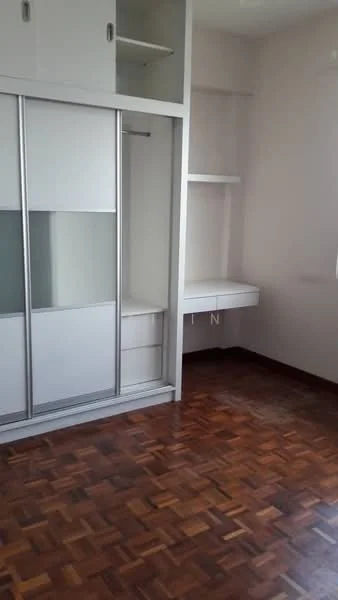 Bedroom features: parquet wood flooring, white painted walls, built-in wardrobe with sliding doors, desk with shelving, natural light from window, neutral color scheme; style: modern.