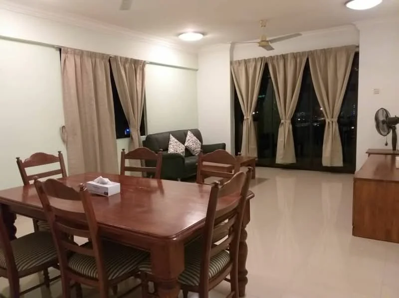 Living features: green fabric sofa, wooden dining table, 6 wooden dining chairs, cream curtains, floor-to-ceiling windows, marble flooring, ceiling fan, decorative cushions, wooden sideboard, city view; style: modern; view: city.