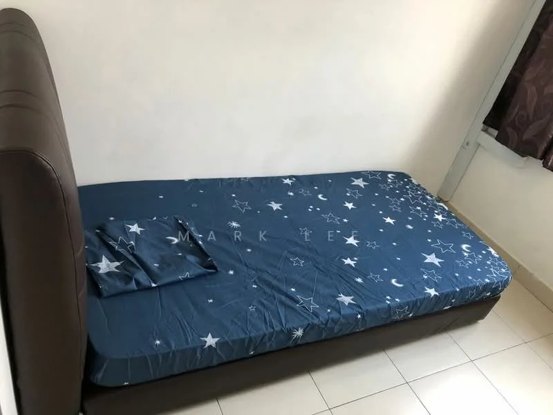 Bedroom features: single bed, brown upholstered headboard, blue star-patterned bed sheet, white walls, tile flooring, curtains, window, pillow.