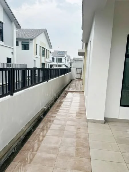 Exterior type: linked terrace house; features: paved walkway, white painted walls, grey tiled flooring, fenced boundary, adjacent houses visible, overcast sky; style: modern.