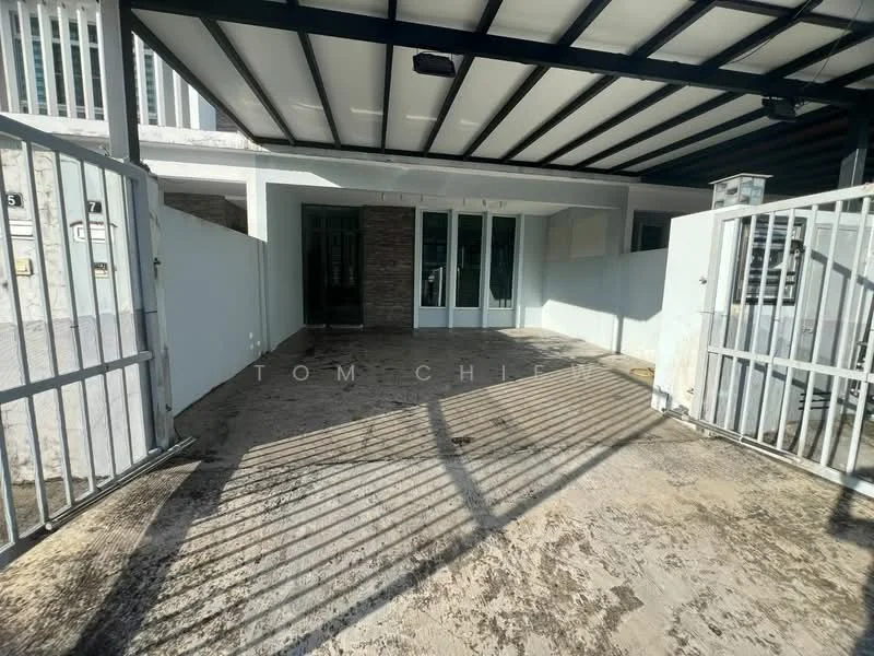 Exterior type: linked terrace house; features: gated entrance, metal gate, concrete flooring, covered car porch, white painted walls, exposed brick wall, sliding glass doors, overhead roof structure, fenced perimeter, natural light from front, manicured landscaping; style: modern.