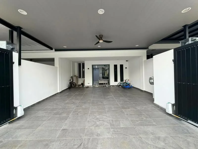Exterior type: car porch; features: grey tiled flooring, white painted walls, ceiling fan, two black gates, open space for parking, bicycle storage area, interior view towards living space, recessed lighting; style: modern.
