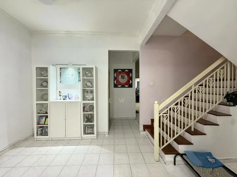 Room features: white painted walls, cream tiled flooring, wooden staircase, built-in display cabinet, decorative items in cabinet, framed artwork on wall, open space layout, light fixture on ceiling; style: modern.
