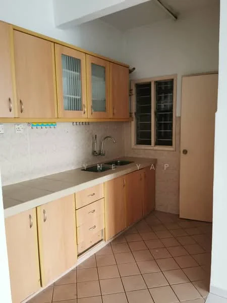 Kitchen features: light wood cabinetry, white countertop, single-bowl stainless-steel sink, chrome faucet, tile backsplash, cream tiled walls, brown tiled flooring, window with metal grille, built-in storage shelves, door leading to hallway.