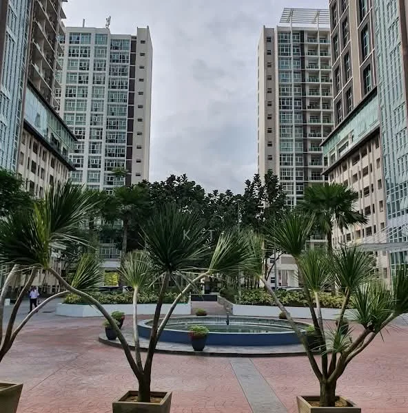 Exterior type: high-rise condominium; features: landscaped garden, water feature, paved walkway, palm trees, surrounding high-rise buildings, outdoor seating area; style: modern.