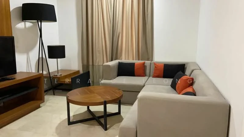 Living features: L-shape sectional sofa in light grey, orange and black accent cushions, wooden coffee table with round top, floor lamp with black shade, TV console in wood finish, wall-mounted TV, cream curtains, marble flooring; style: modern.