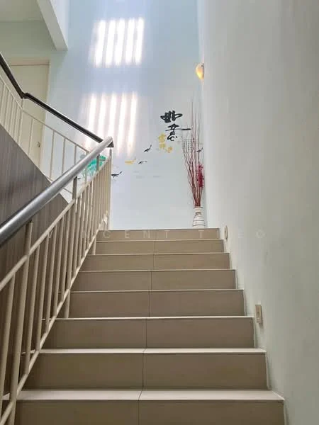 Room features: staircase with beige tiled steps, white painted walls, decorative wall art, natural light from windows, light fixture on wall, decorative vase with branches, handrail with wooden finish, metal railing; style: modern.