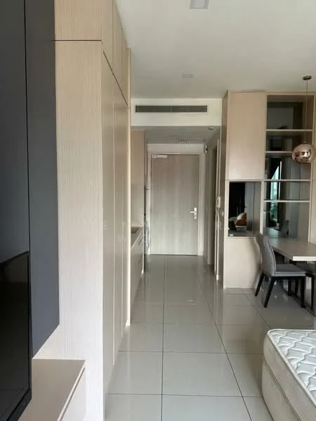 Room features: light-colored wood cabinetry, white walls, glossy tile flooring, recessed ceiling lights, open layout, dining table with chairs, doorway leading to another room, built-in storage, large windows, neutral color palette; style: modern.