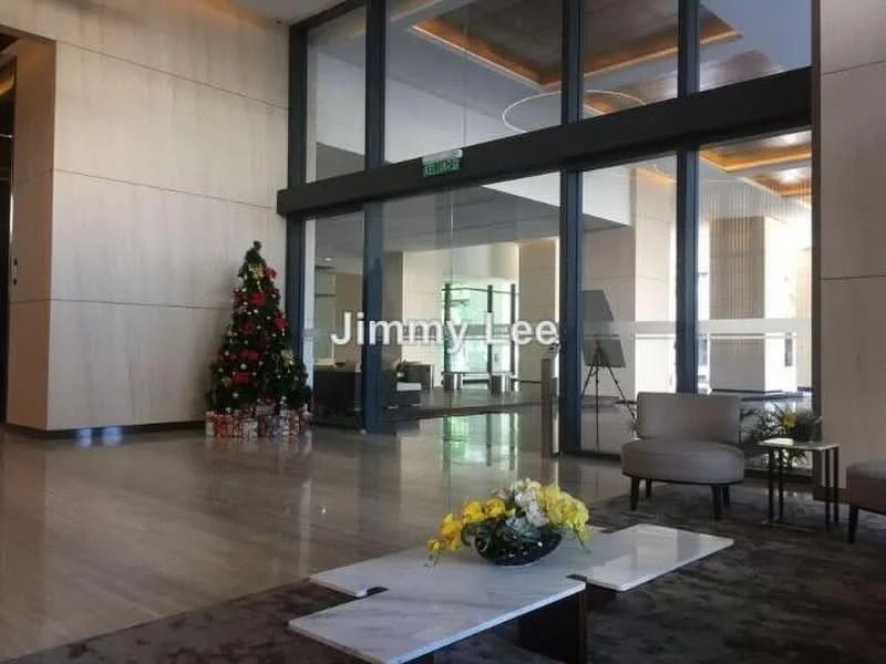 Room features: marble flooring, large glass entrance doors, decorative Christmas tree, modern lighting fixtures, recessed ceiling lights, wood paneling on walls, seating area with armchairs, coffee table with floral arrangement, artwork on easel, large windows allowing natural light; style: modern; view: lobby.