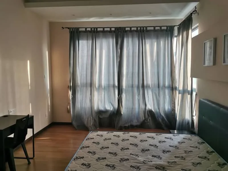 Bedroom features: wooden flooring, cream painted walls, floor-to-ceiling windows, sheer curtains, blackout curtains, upholstered headboard, bed with mattress, study desk, decorative wall art; style: modern.