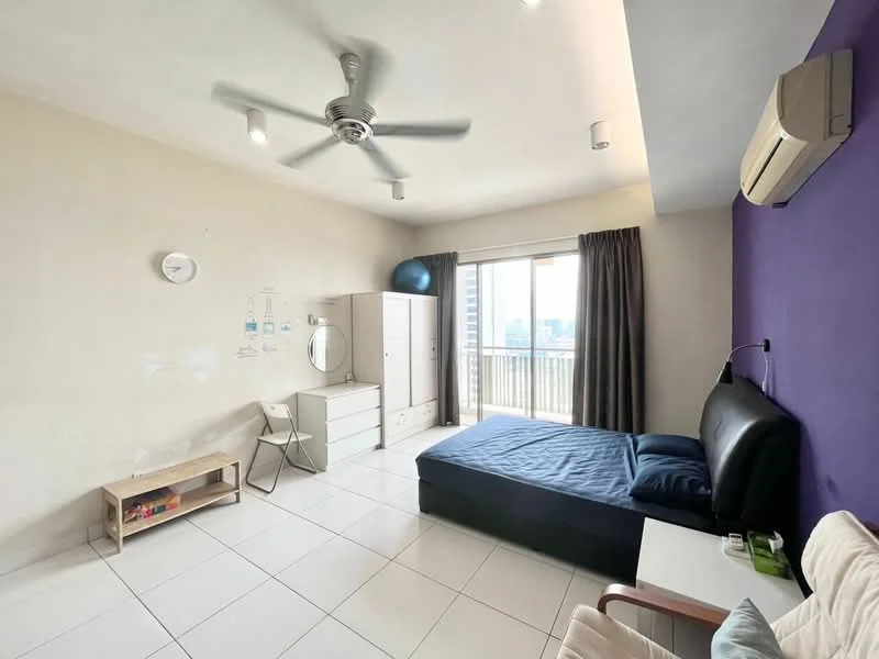 Bedroom features: queen-size bed with dark blue bedding, black leather headboard, white painted walls, purple accent wall, white ceiling with recessed lighting, 5-blade ceiling fan, floor-to-ceiling windows, curtains in dark grey, built-in wardrobe, mirror on wall, white tiled flooring, small side table, chair, exercise ball; style: modern; view: city.