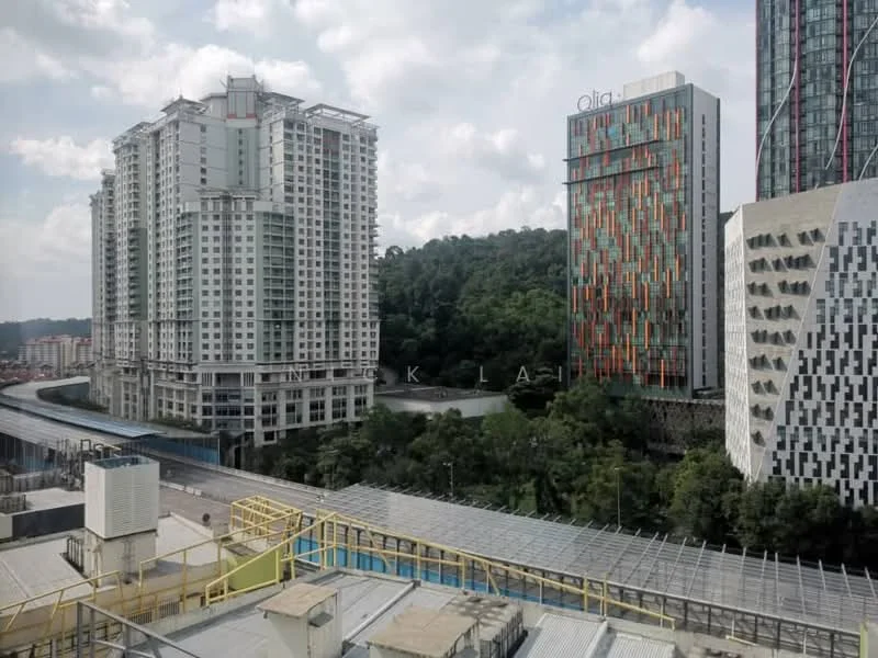 Exterior type: high-rise condominium; features: glass curtain wall, exposed concrete facade, mature trees in background, surrounded by greenery, urban context with skyline view, multiple balconies, varied architectural design, adjacent to railway, multi-storey buildings; style: modern.