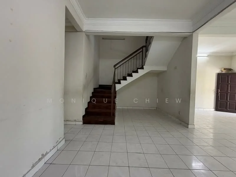 Room features: white painted walls, white ceiling, tile flooring, staircase with wooden steps, handrail on staircase, empty space, natural light from windows, no visible furniture; style: minimalist.