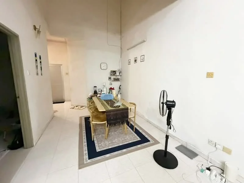 Dining features: white painted walls, tile flooring, dining table with four chairs, area rug, wall-mounted clock, fan on stand, decorative wall frames, floor lamp.