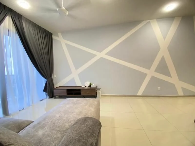 Living features: grey fabric sofa, flat-screen TV on wooden console, cream painted walls with geometric pattern, white ceiling, recessed downlights, floor-to-ceiling windows with sheer curtains, light-colored tiled flooring, ceiling fan; style: modern.