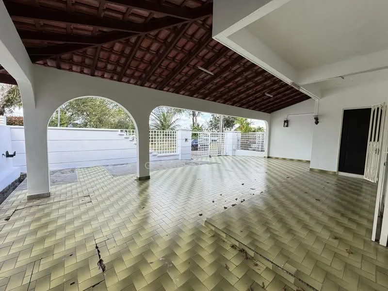 Exterior features: covered patio area, herringbone-patterned floor tiles in yellow, arched openings, white painted walls, exposed wooden ceiling beams, fenced perimeter, outdoor space with greenery visible, light fixture on wall, open layout; style: modern.