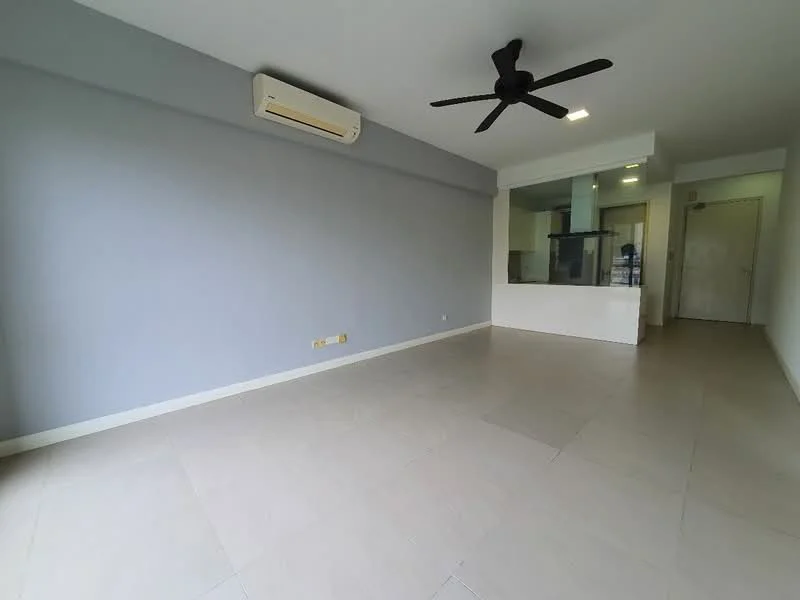 Living features: light grey painted walls, tile flooring, 5-blade ceiling fan with light, wall-mounted split AC, open layout to kitchen, large windows, neutral decor, no visible furniture; style: modern.