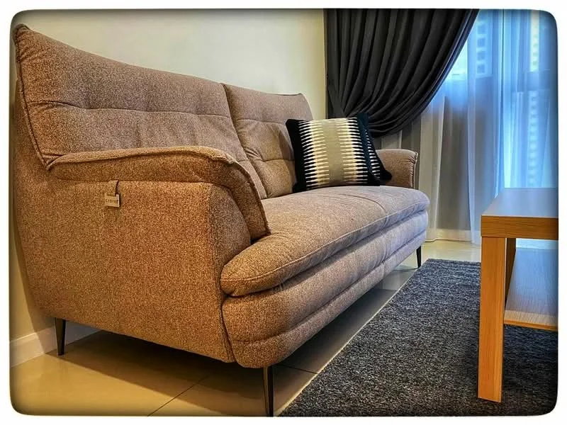 Living features: 3-seater fabric sofa in beige, decorative cushion, wooden coffee table, area rug in dark grey, floor-to-ceiling window, curtains in dark fabric, light-colored tiled flooring; style: modern.