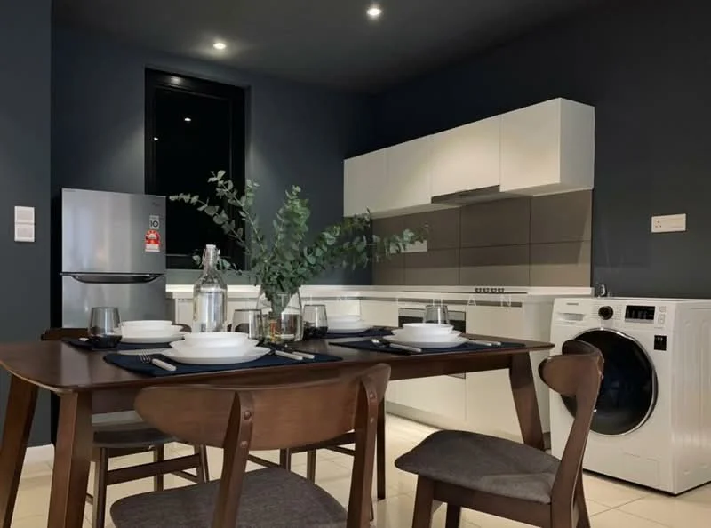 Kitchen features: white shaker cabinets, grey tile backsplash, stainless-steel fridge, built-in oven, 4-burner gas hob, single-bowl stainless-steel sink, chrome pull-down faucet, white washing machine, dining table with 4 wooden chairs, glass vase with greenery, table setting with plates and glasses, recessed downlights, dark blue painted walls, tile flooring; style: modern.