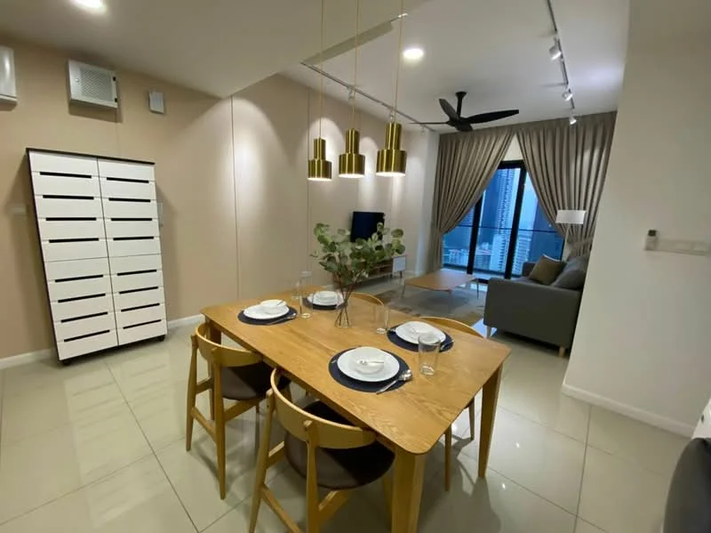 Dining features: wood dining table, 4 wooden dining chairs, white plates, glassware, gold pendant lights, recessed downlights, cream painted walls, glossy tile flooring, wall-mounted TV, grey sofa, floor-to-ceiling windows with city view, curtains, decorative plant; style: modern; view: city.