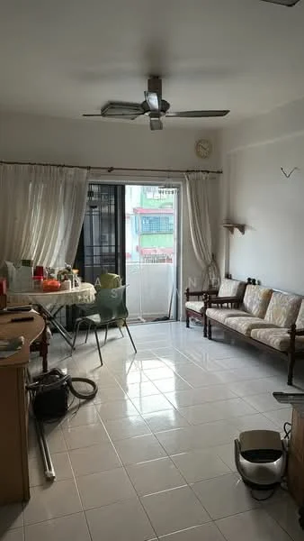 Living features: white painted walls, glossy white tile flooring, 5-blade ceiling fan, sliding glass door, sheer curtains, wooden sofa with floral upholstery, round dining table with chairs, wall-mounted shelf, clock on wall, open space layout, natural light from balcony; style: modern; view: city.