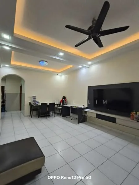 Living features: white painted walls, tray ceiling with recessed lighting, 5-blade ceiling fan, large wall-mounted TV, TV console with storage, dining table with chairs, study desk, tile flooring, sofa, decorative wall art; style: modern.